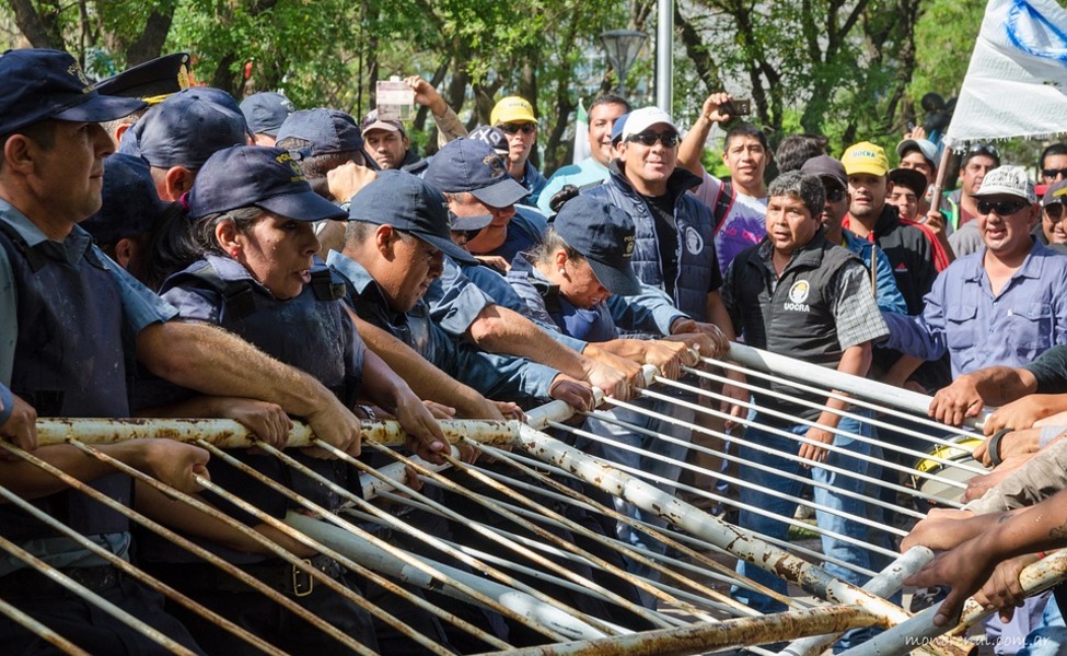 Large protest police fences workers 2111886